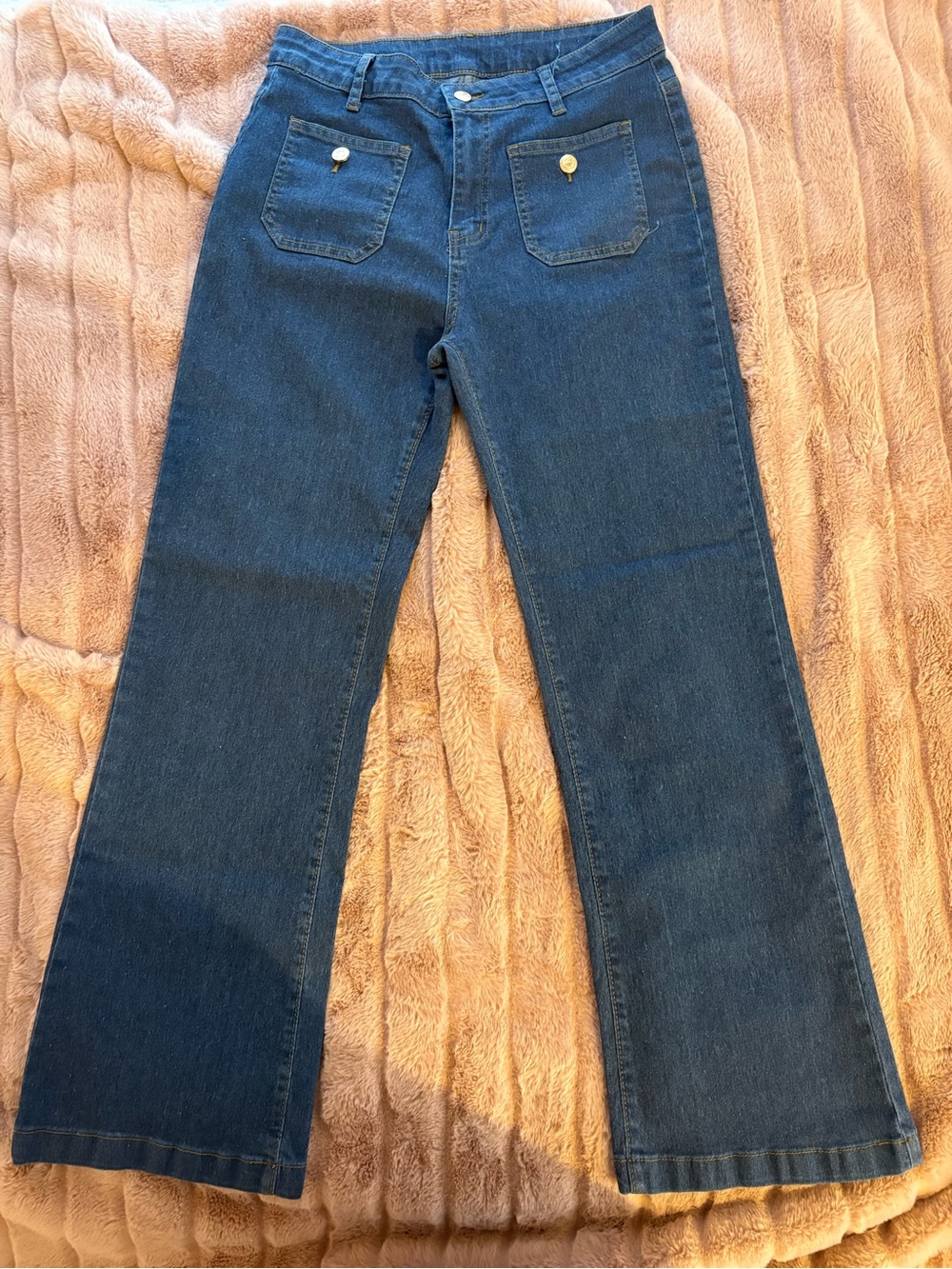 Dark Blue Wide Leg Flare Jeans with cute pocket detail. Size M. Stretch